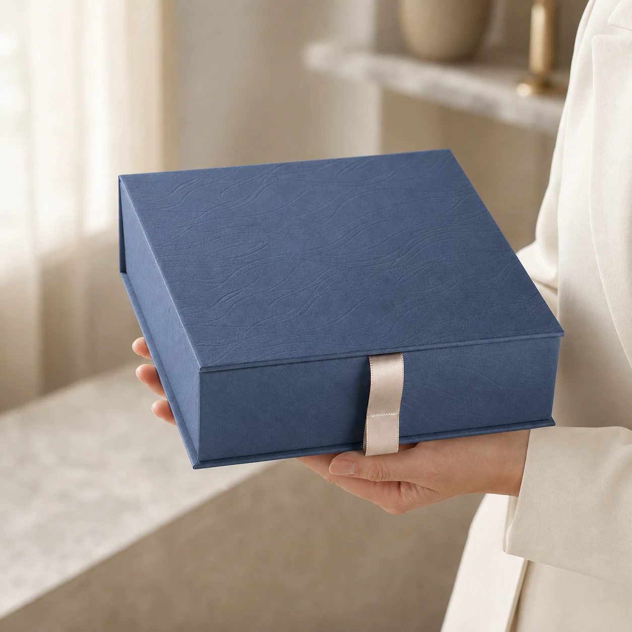 Gift box presented by hand