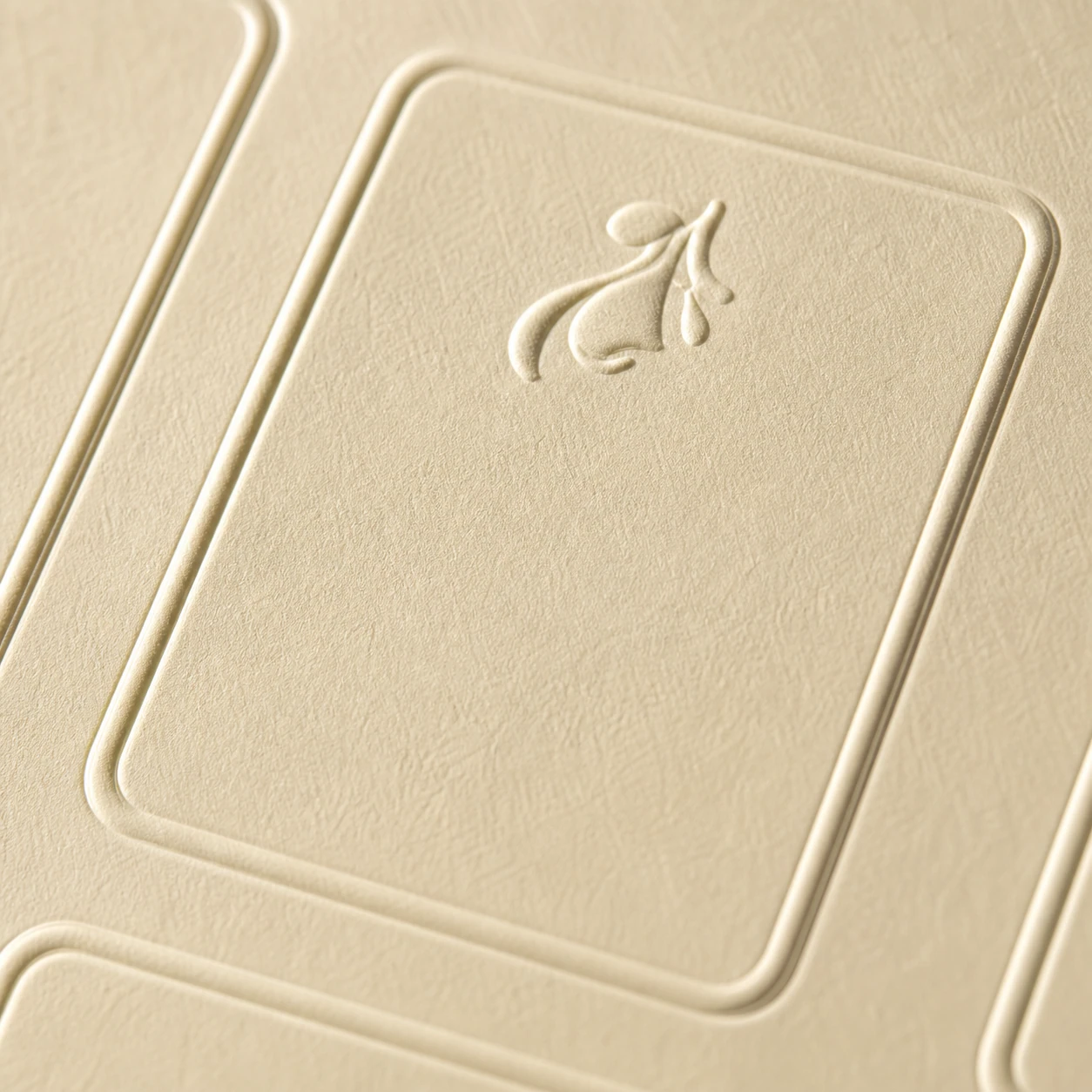Macro detail of embossed and foiled label stock