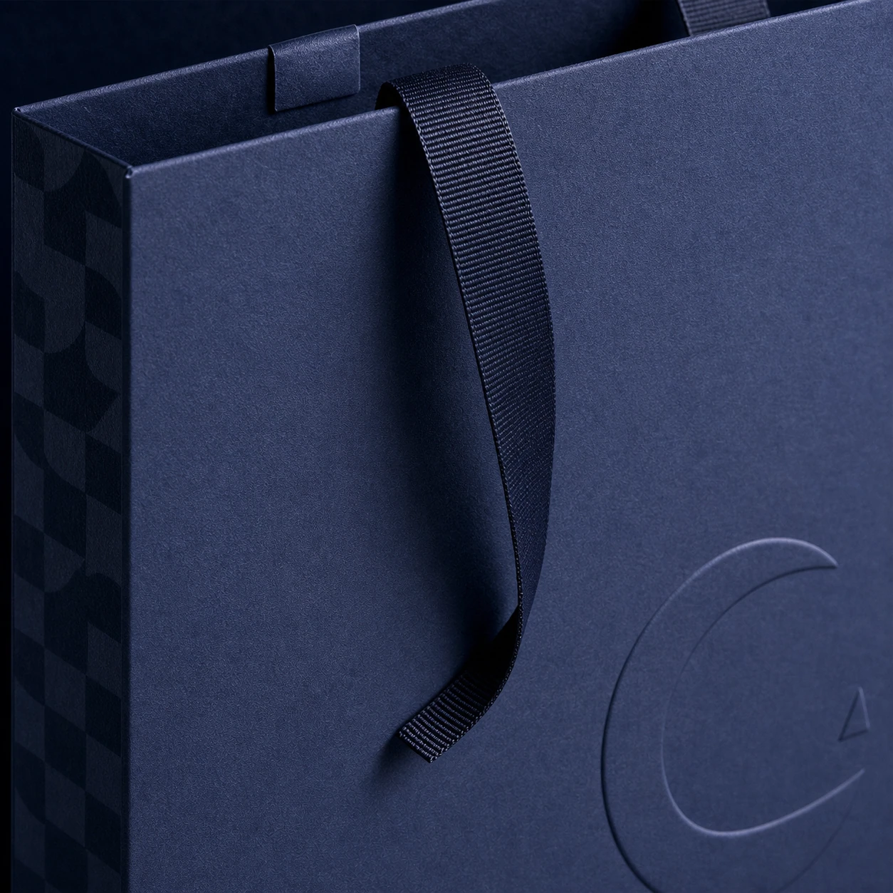 Close detail of ribbon handle and paper texture
