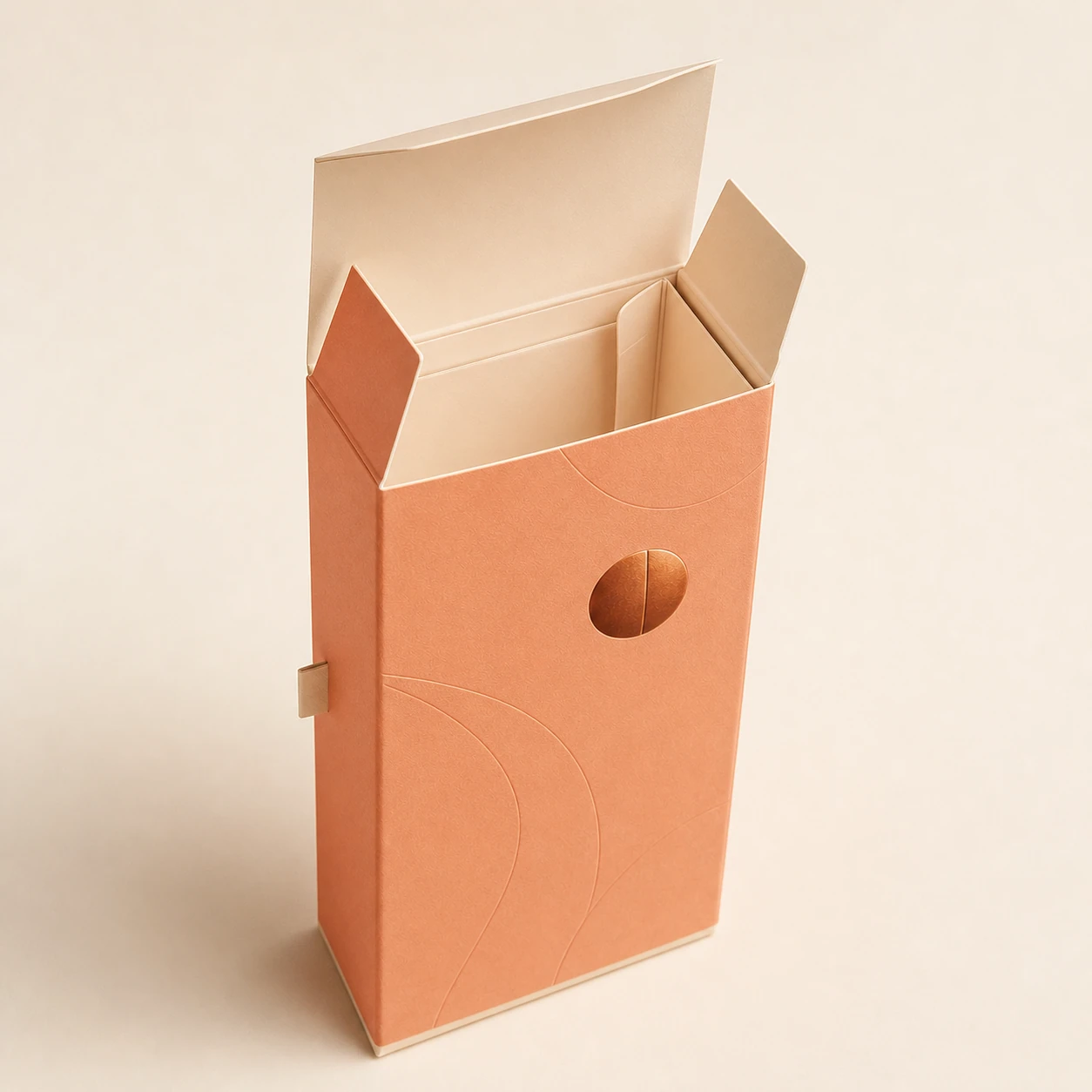 Perfume carton with its tuck flaps open